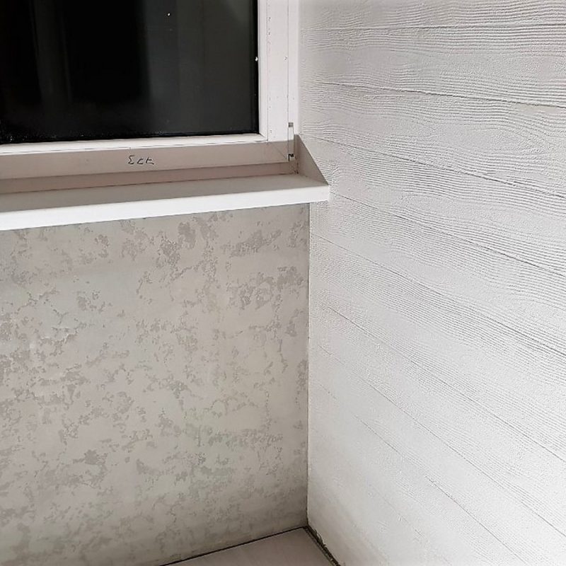 stucco with wooden decor